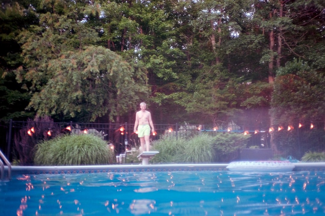 A clean, freshly serviced residential backyard pool