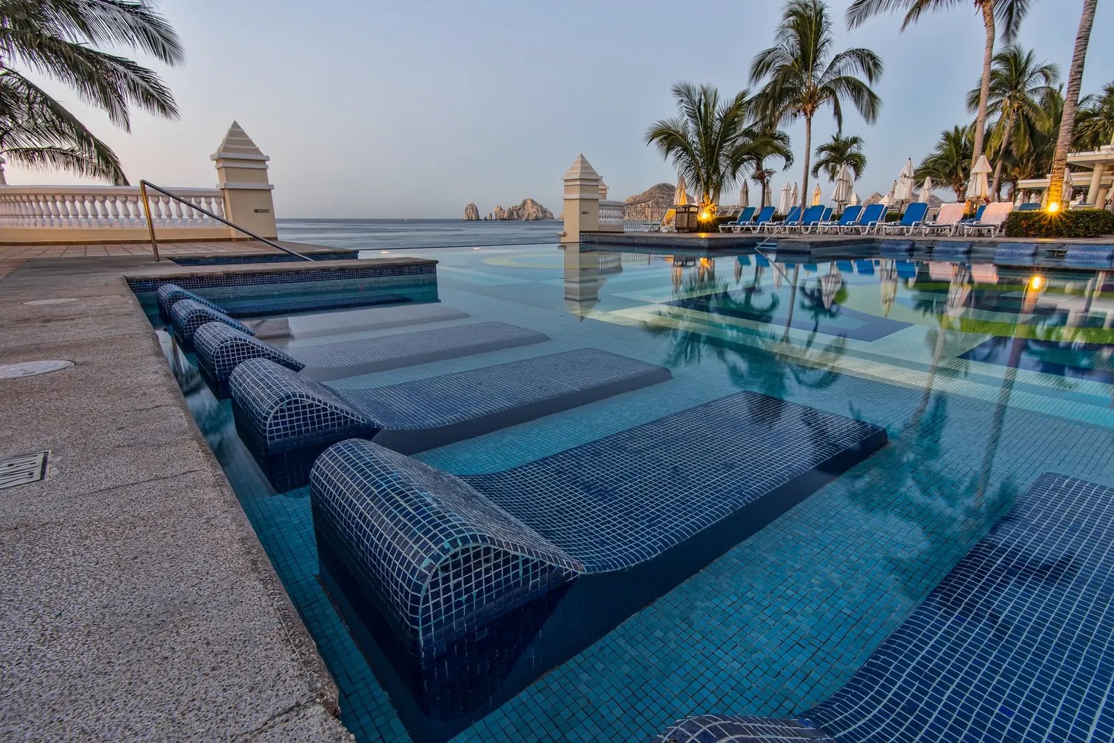 A large shared commercial pool with clear water