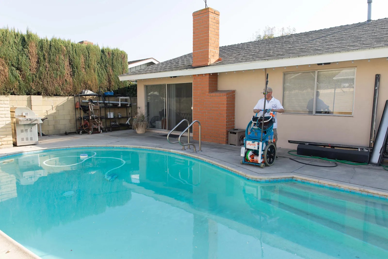 A clear, recovered residential backyard pool