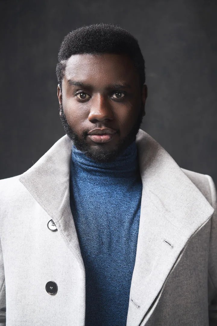 Real professional portrait with natural expression and lighting