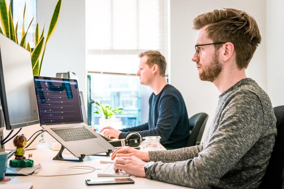 Professional working at a computer in an office